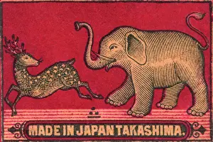 Matchboxes: Old Japanese Matchbox label with an elephant chasing a deer
