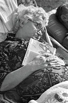 Agatha: Old lady asleep with paperback book