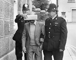 Obstructed: Old Man arrested - face covered