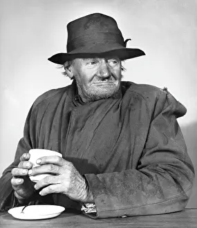Shabby: Old man with cup of tea, Balham, SW London