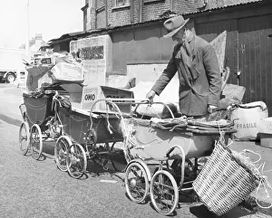 Prams: Old man with prams and junk, Balham, SW London