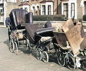 Prams: Old man pulling prams, Balham, SW London