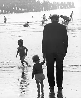 Grandpa: Old man with young child at Blackpool