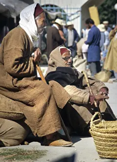 Souk: Two old men with djellebas and chechia hats