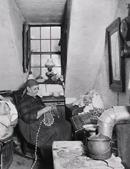 Riis: OLD MRS. BENOIT IN HER HUDSON STREET ATTIC