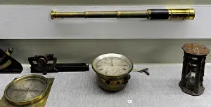 Telescope: Old navigational instruments. Vintage telescope, compass, ho