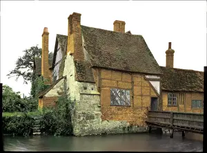Timbered: Old timbered house by a river