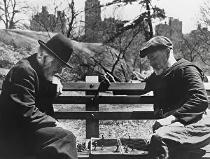 High Rise: Two old-timers playing chess on a Central Park