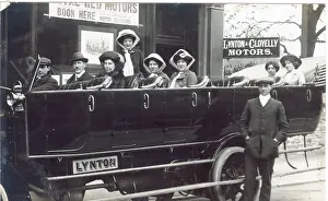 Suited: Open air charabanc with smart lady passengers