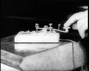 Someone: Someone Operating a Telegraph Machine