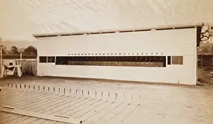 Flooring: Operating track, covered with rubber flooring, and crossed w