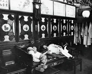 Smokers: Two opium smokers, China