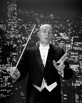 Tempo: Orchestra Conductor Hold Baton
