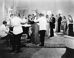 Flirtatious: Orchestra playing and couples dancing