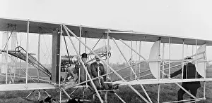 Dayton: Orville seated in Wright airplane with Albert B. Lambert bef