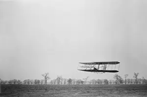 Ppprs: Orville Wright 1871-1948 in flight over ?