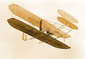 Epromo06052019: Orville Wright in Wright Flyer, 1908