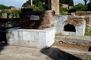 Placard: Ostia Antica. The Shops of Fishmongers