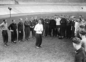 Stadion: Otto Nerz with athletes in Berlin, 1933