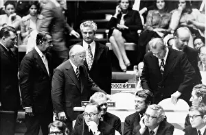 Winzer: Otto Winzer taking his seat at a meeting