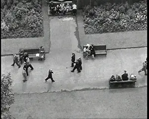 Planted: An Overhead Shot of Pedestrians Walking Up