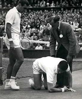 Tangled: Owen Davidson and Roy Emerson in match at Wimbledon
