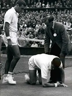 Tangled: Owen Davidson and Roy Emerson in match at Wimbledon