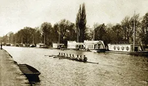 Towpath: Oxford Eight practising on the River Thames with Houseboats