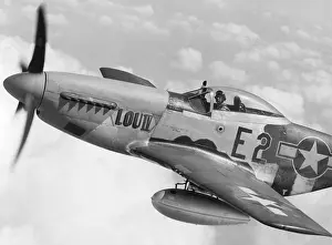 P 51: P-51 Mustang fighter plane in flight. It was a