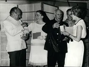 Cocteau: Pablo Picasso and others at an art gallery, Cannes