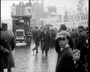 Packed: Packed Pavement on a British Street. Behind