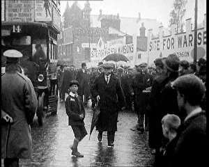 Packed: Packed Pavement on a British Street. Behind