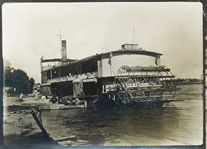 Sepia Images: Paddle steamer moored