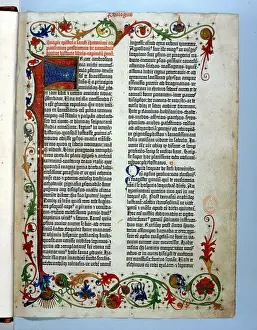 1456: Page of Bible printed by Gutenberg, 1456. Illuminated