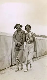 Blustery: Paignton, Devon - Two young women at the seaside