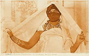 Forearm: Painted Tunisian Beauty with veiled face