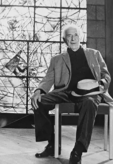 Chagall: The painter Marc Chagall in front of one of his
