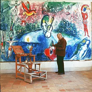 Chagall: Painter Marc Chagall and his painting Commedia