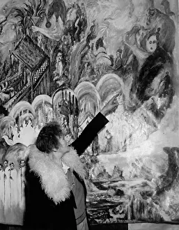Extravagance: Painter shows detail of a painting