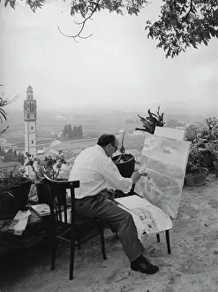 Sotto: A painter in Sotto il Monte (Bergamo). Italy