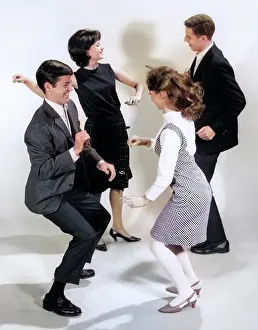 Compatible: Pair of Young Teenage Couples Dancing