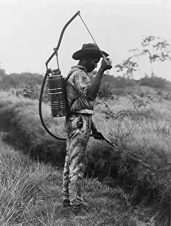 Insecticides: Panamanian man with a canister on his back ?