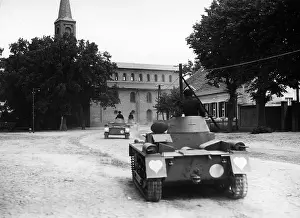 Affiliation: Panzer I pass through a town in the 30s