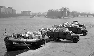Recycled: Paper recycling - trucks - dumping - river barge