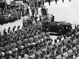 Gesticulating: Parade of the Reich Labor Service before Adolf Hitler on the