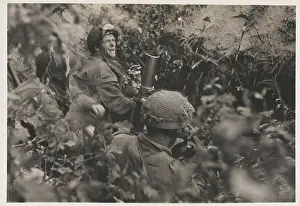 Relating: Paratroops in action with 3 in mortars firing on enemy posit