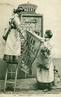 Feminists: Two Parisian Feminists putting up a Poster