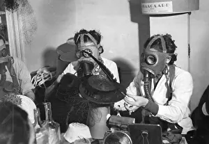 Seamstress: Parisian milliners work while wearing breathing masks, 1939