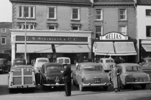 Woolworths: A parking attendant writing out ticket, Middlesex