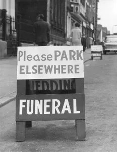 Signposts: NO PARKING SIGN